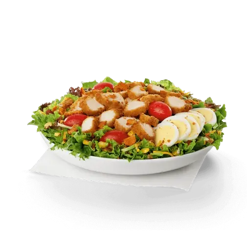 Chick-fil-A Cobb Salad with chicken, cheese, bacon, egg, tomatoes, corn, and mixed greens
